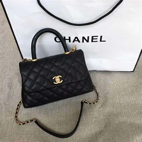 chanel handle bag small|Chanel handbag with top handle.